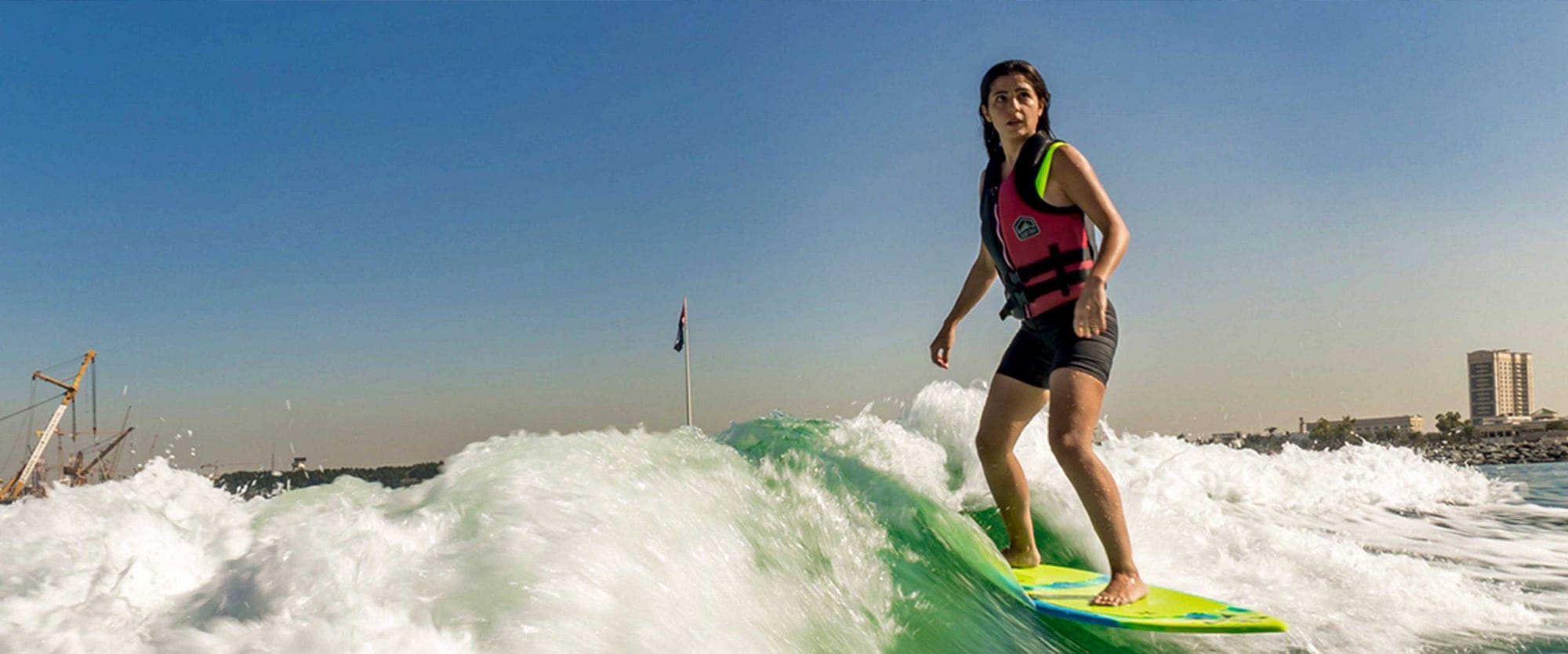women wakesurfing near Jumeirah